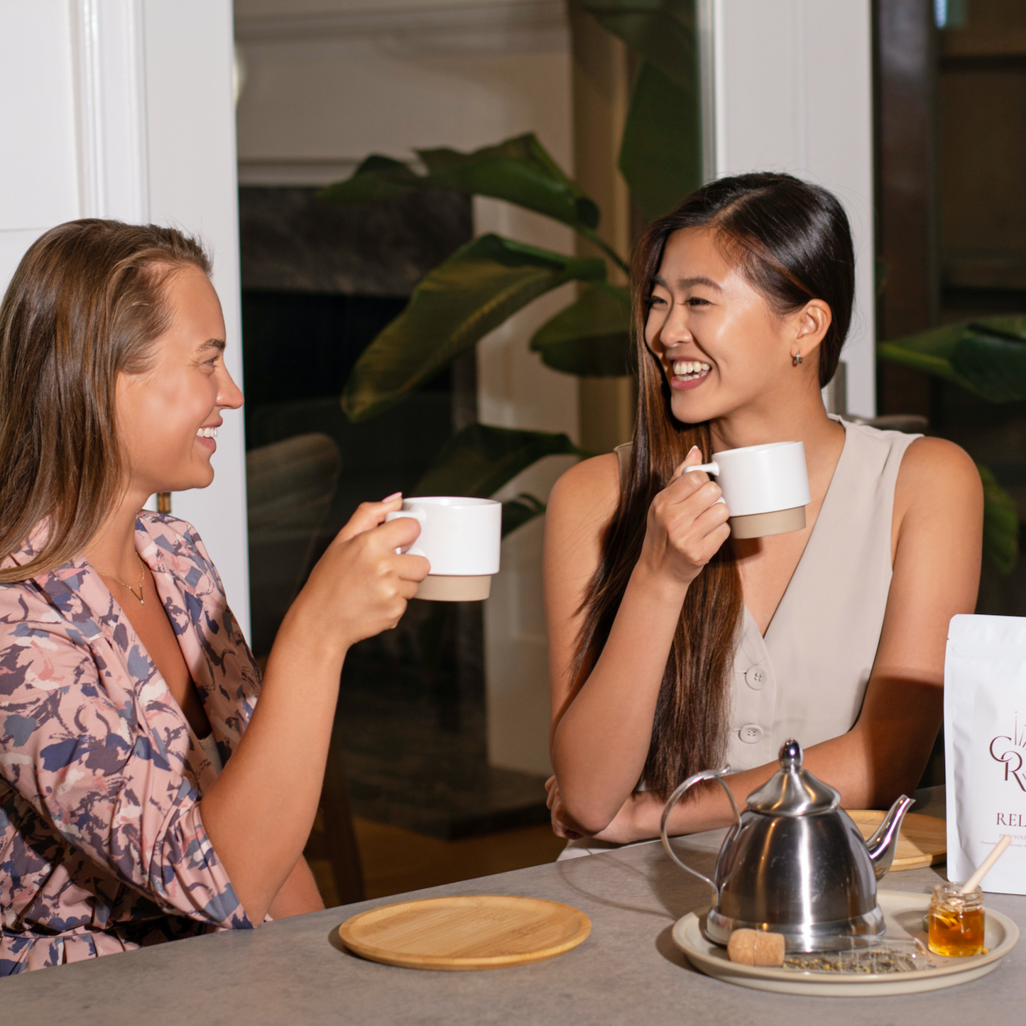 Women enjoying Resilient Loose Leaf Tea during productive work session