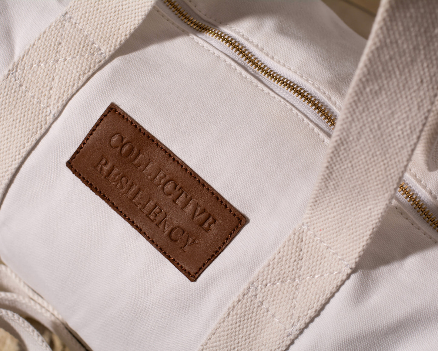 White Canvas Duffle Bag - Collective Resiliency 